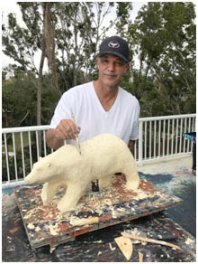Wyland working on a sculpture